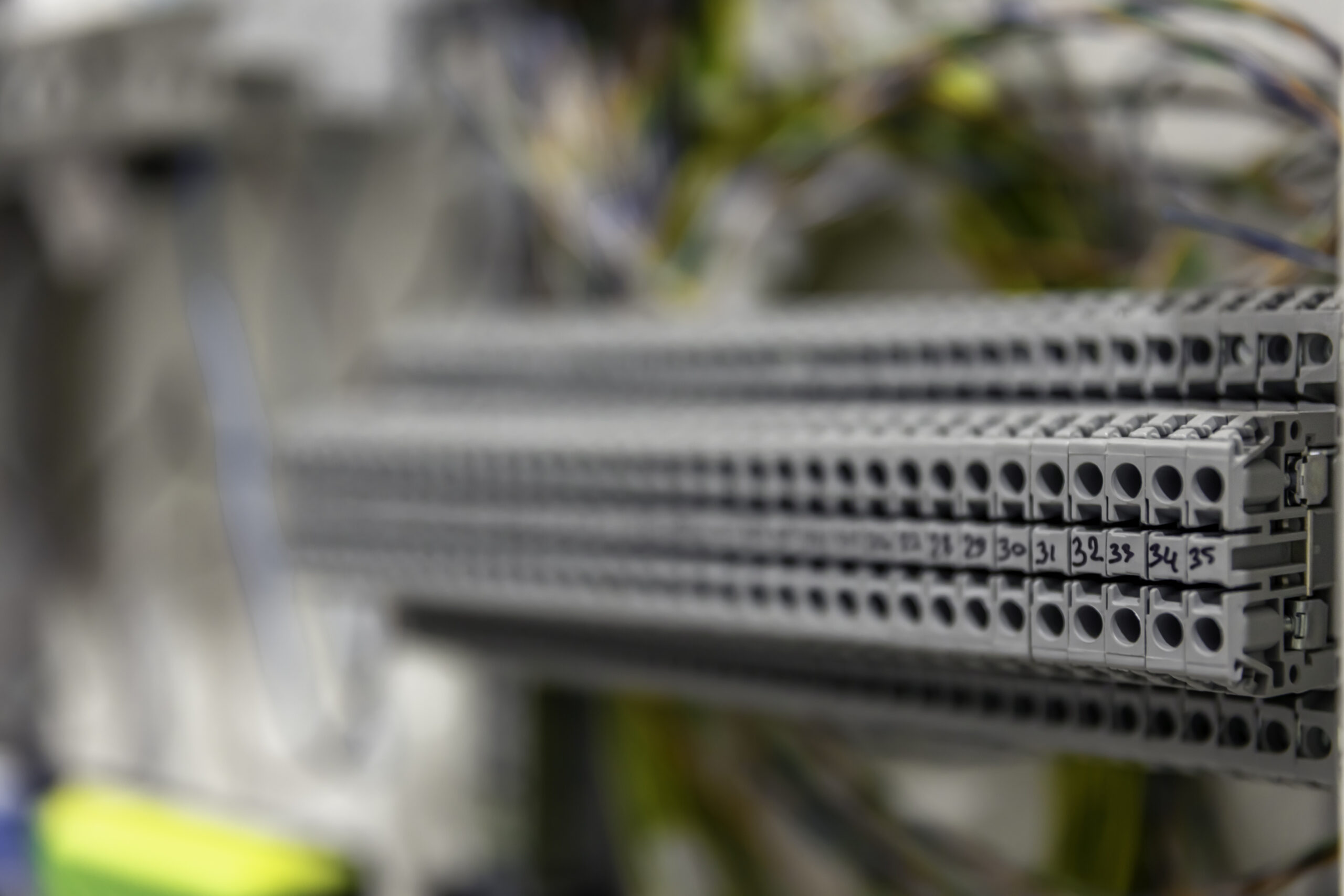 Electrical panel with fuses and contactors, close-up.